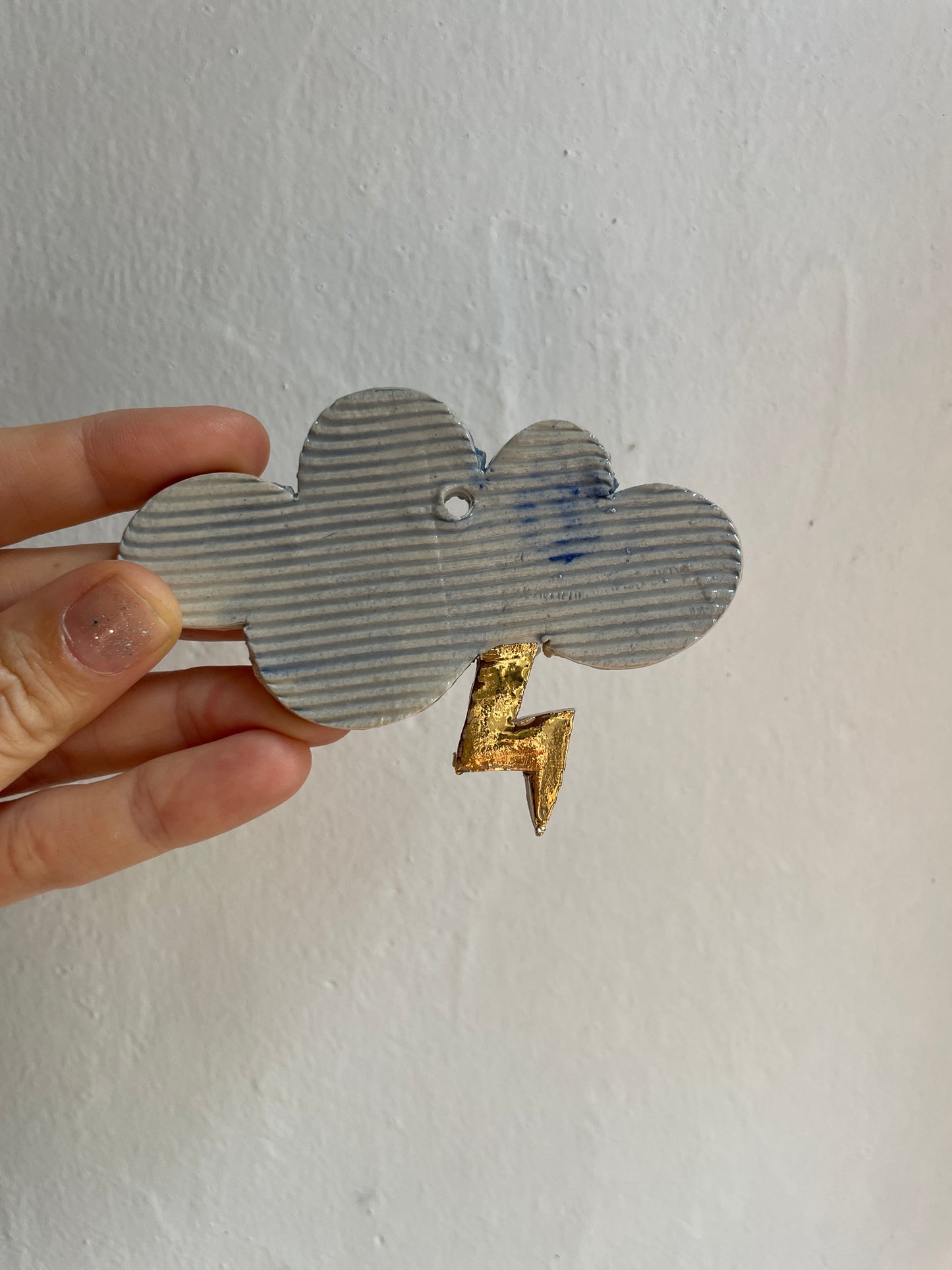 Nuvoletta con fulmine oro