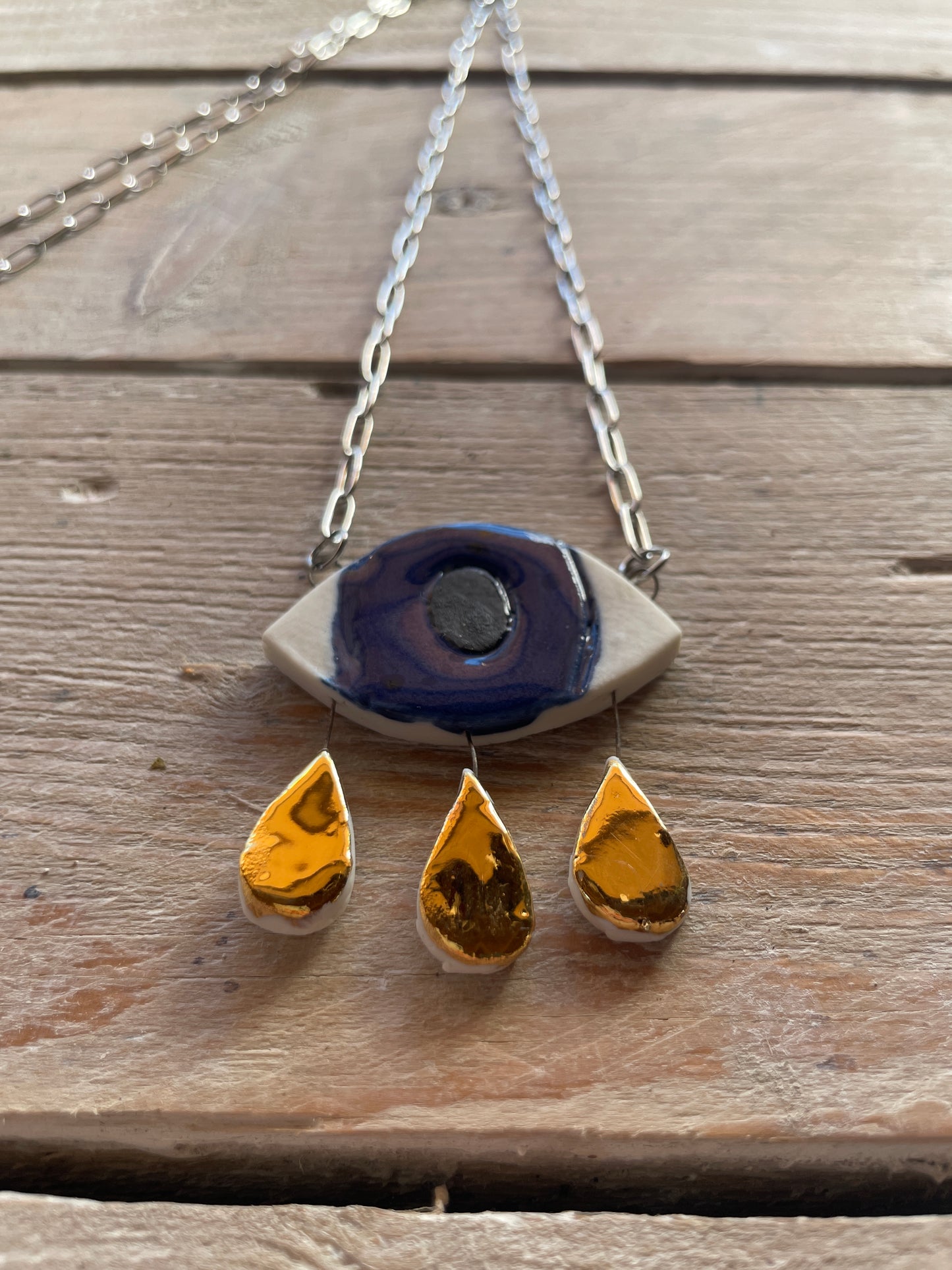 Collana occhio porcellana e lustro oro