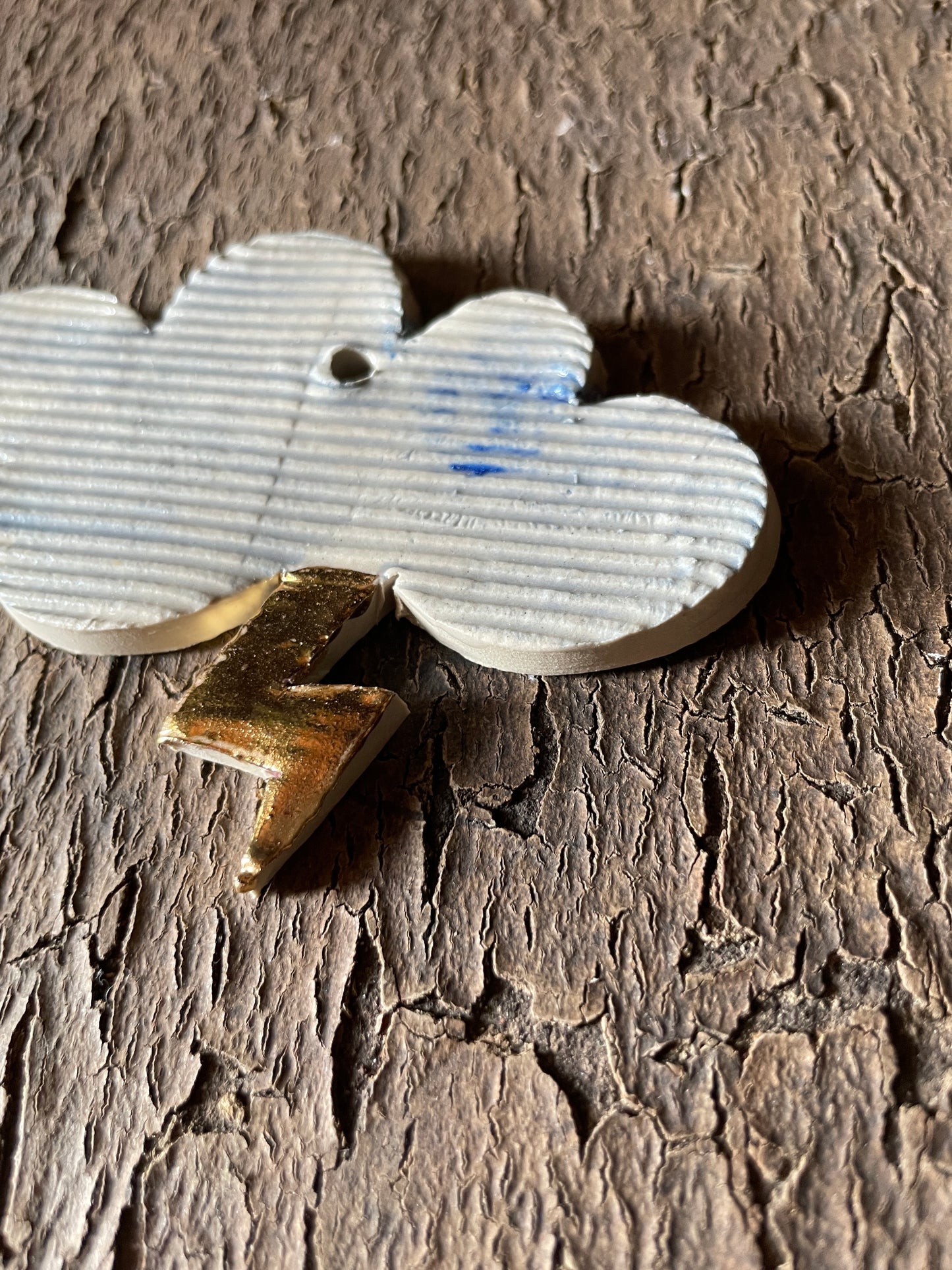 Nuvoletta con fulmine oro